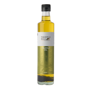 Dark glass bottle with a black label. Truffle Hill brand Truffle Oil.